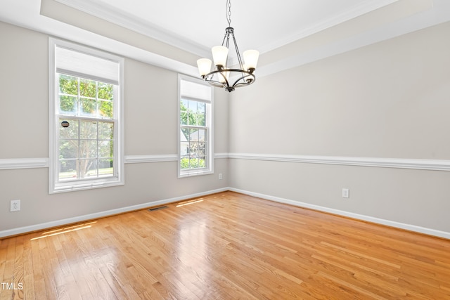 203 Worsham Dr, Chapel Hill, NC 27516 - spare room with a chandelier, crown molding, healthy amount of natural light, wood finished floors, and baseboards