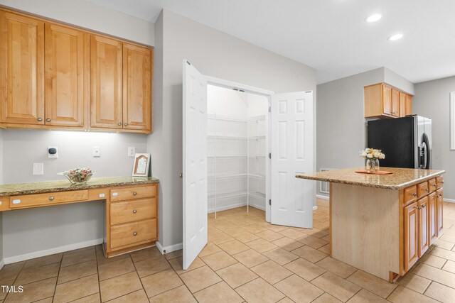 203 Worsham Dr, Chapel Hill, NC 27516 - kitchen with stainless steel refrigerator with ice dispenser, recessed lighting, light stone countertops, baseboards, and light tile patterned flooring