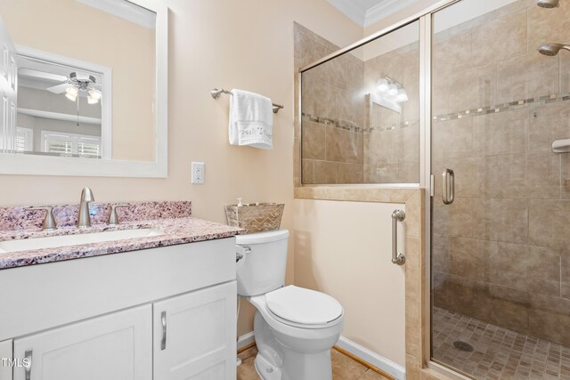 203 Worsham Dr, Chapel Hill, NC 27516 - full bathroom featuring toilet, vanity, a stall shower, ceiling fan, and crown molding