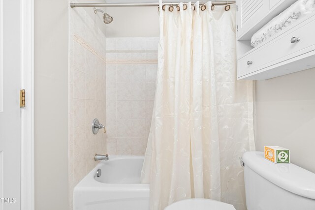 203 Worsham Dr, Chapel Hill, NC 27516 - bathroom featuring toilet and shower / tub combo with curtain