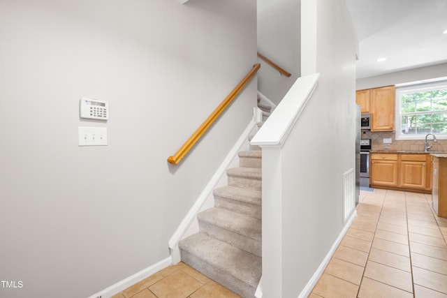 203 Worsham Dr, Chapel Hill, NC 27516 - stairway featuring tile patterned flooring, baseboards, and recessed lighting