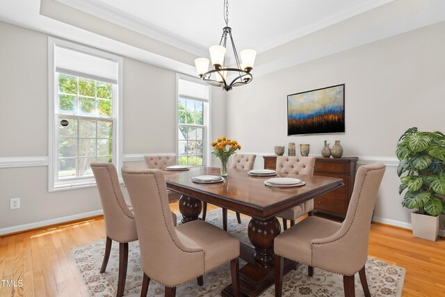 203 Worsham Dr, Chapel Hill, NC 27516 - dining space with a chandelier, light wood finished floors, healthy amount of natural light, and ornamental molding