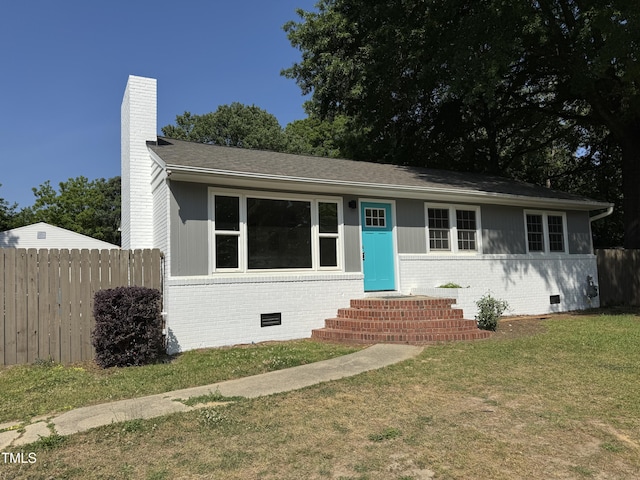 3804 Cobb St, Garner, NC 27529 - view of front facade featuring entry steps, crawl space, brick siding, and a chimney