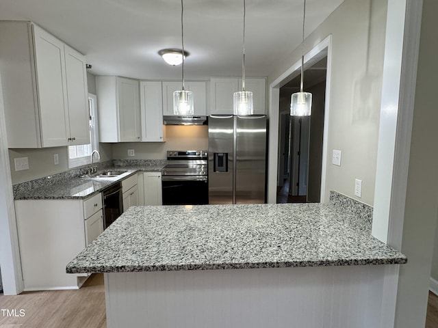 3804 Cobb St, Garner, NC 27529 - kitchen with stainless steel appliances, a sink, light stone counters, a peninsula, and under cabinet range hood