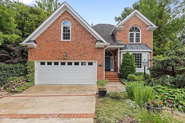 2001 Dobson Ct, Raleigh, NC 27612 - traditional-style house featuring brick siding, concrete driveway, an attached garage, and a shingled roof