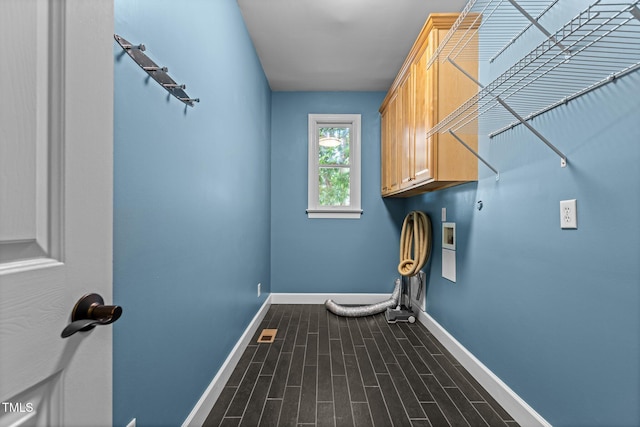2001 Dobson Ct, Raleigh, NC 27612 - laundry room with cabinet space, washer hookup, baseboards, and dark wood finished floors