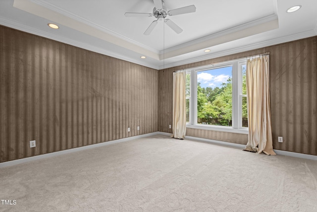 2001 Dobson Ct, Raleigh, NC 27612 - carpeted empty room featuring crown molding, a raised ceiling, recessed lighting, ceiling fan, and baseboards