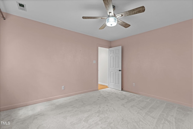 2001 Dobson Ct, Raleigh, NC 27612 - unfurnished room with a ceiling fan, light colored carpet, and baseboards