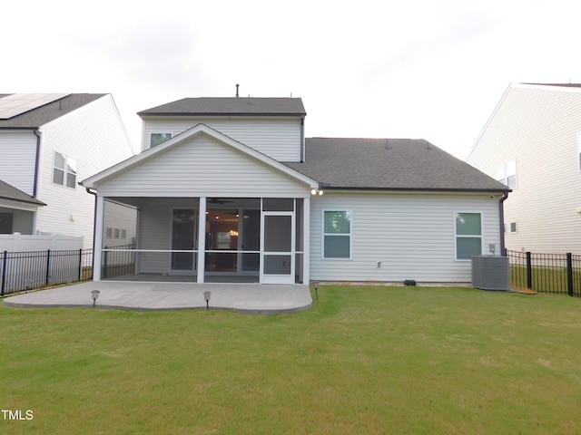 1311 Arena Ln, Fuquay Varina, NC 27526 - rear view of property with a sunroom, central air condition unit, a patio area, and roof with shingles