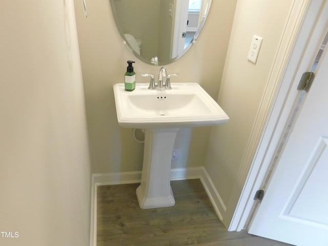 1311 Arena Ln, Fuquay Varina, NC 27526 - bathroom with wood finished floors and baseboards