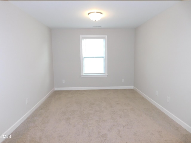 1311 Arena Ln, Fuquay Varina, NC 27526 - spare room with light carpet and baseboards
