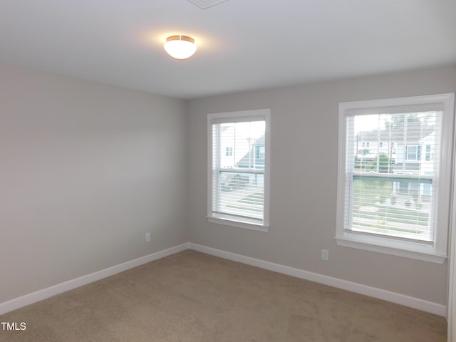 1311 Arena Ln, Fuquay Varina, NC 27526 - unfurnished room featuring light carpet and baseboards
