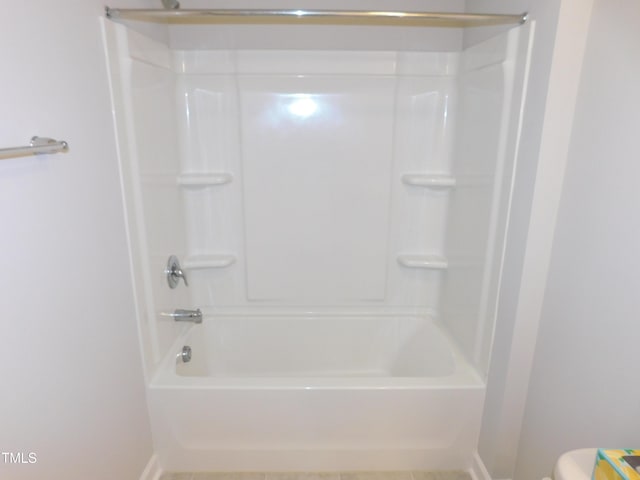 1311 Arena Ln, Fuquay Varina, NC 27526 - full bathroom with baseboards, tub / shower combination, and toilet