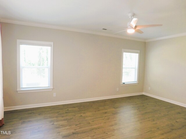 1311 Arena Ln, Fuquay Varina, NC 27526 - unfurnished room featuring ornamental molding, dark wood-type flooring, a ceiling fan, and baseboards