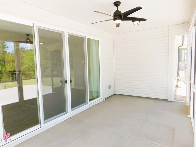 1311 Arena Ln, Fuquay Varina, NC 27526 - unfurnished sunroom featuring a ceiling fan, healthy amount of natural light, and concrete floors