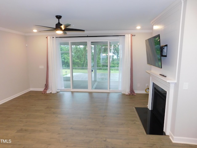 1311 Arena Ln, Fuquay Varina, NC 27526 - unfurnished living room with crown molding, baseboards, a ceiling fan, a fireplace with flush hearth, and wood finished floors