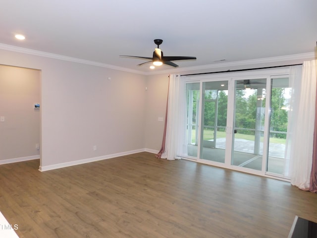1311 Arena Ln, Fuquay Varina, NC 27526 - unfurnished room featuring crown molding, ceiling fan, baseboards, wood finished floors, and recessed lighting