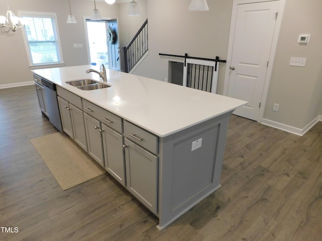 1311 Arena Ln, Fuquay Varina, NC 27526 - kitchen with gray cabinetry, a sink, dark wood finished floors, and baseboards