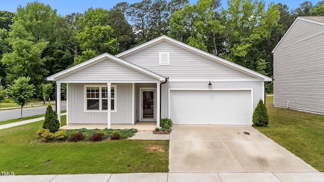 1401 Justice Union Ct, Raleigh, NC 27604 - single story home with covered porch, a garage, concrete driveway, and a front yard