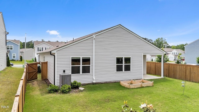 1401 Justice Union Ct, Raleigh, NC 27604 - rear view of house with a vegetable garden and a residential view