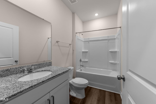 1401 Justice Union Ct, Raleigh, NC 27604 - bathroom featuring vanity, wood finished floors, toilet, and bathing tub / shower combination