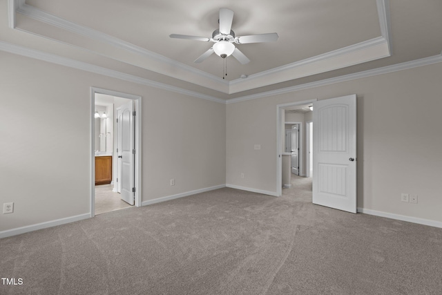 2082 Weston Green Loop, Cary, NC 27513 - unfurnished bedroom with a tray ceiling, crown molding, carpet flooring, and baseboards