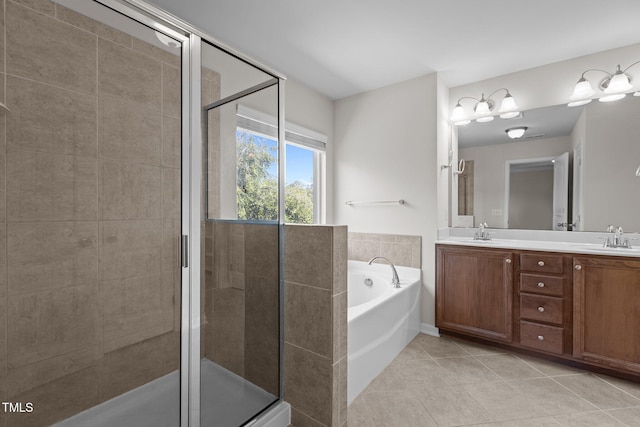 2082 Weston Green Loop, Cary, NC 27513 - bathroom with tile patterned floors, a garden tub, double vanity, and a shower stall