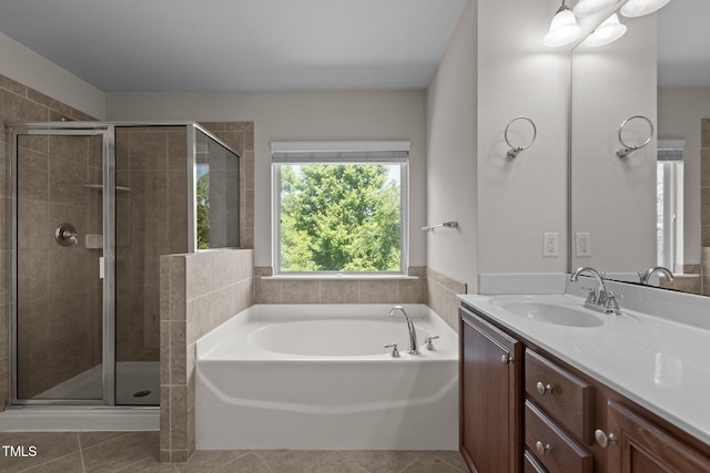 2082 Weston Green Loop, Cary, NC 27513 - full bath featuring vanity, a garden tub, a stall shower, and tile patterned floors