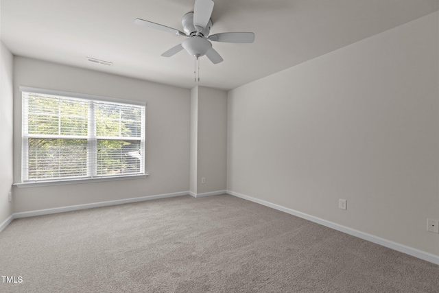 2082 Weston Green Loop, Cary, NC 27513 - carpeted empty room with baseboards and a ceiling fan