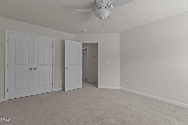 2082 Weston Green Loop, Cary, NC 27513 - unfurnished bedroom with carpet, a closet, baseboards, and a ceiling fan