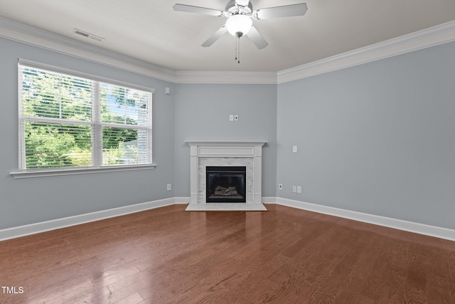 2082 Weston Green Loop, Cary, NC 27513 - unfurnished living room featuring a fireplace with flush hearth, crown molding, wood finished floors, baseboards, and a ceiling fan