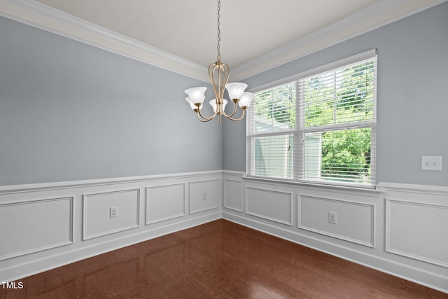2082 Weston Green Loop, Cary, NC 27513 - spare room featuring crown molding, a chandelier, wainscoting, dark wood-type flooring, and a decorative wall