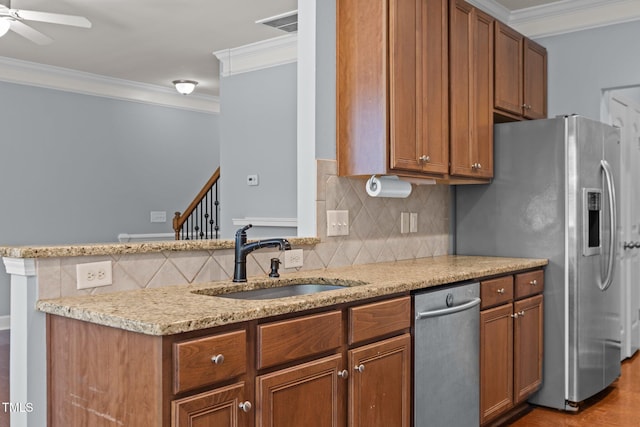 2082 Weston Green Loop, Cary, NC 27513 - kitchen featuring a sink, ornamental molding, tasteful backsplash, brown cabinets, and stainless steel refrigerator with ice dispenser