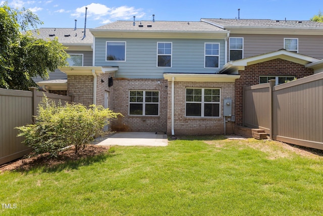 2082 Weston Green Loop, Cary, NC 27513 - back of house with brick siding and a patio