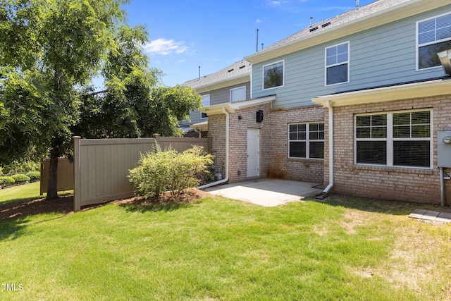 2082 Weston Green Loop, Cary, NC 27513 - back of property featuring brick siding and a patio