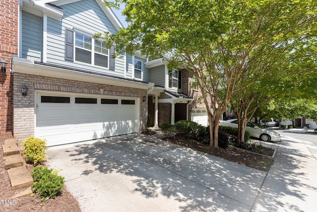 2082 Weston Green Loop, Cary, NC 27513 - multi unit property with an attached garage, driveway, and brick siding