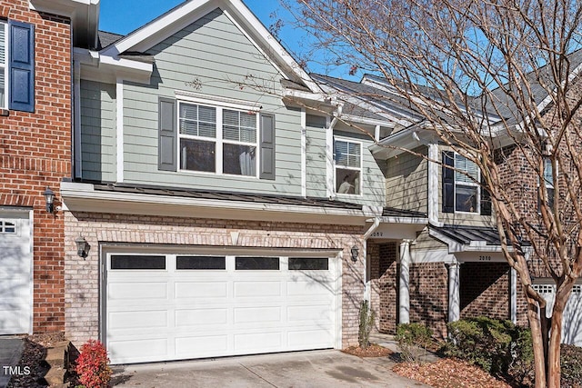 2082 Weston Green Loop, Cary, NC 27513 - multi unit property with brick siding, an attached garage, and concrete driveway