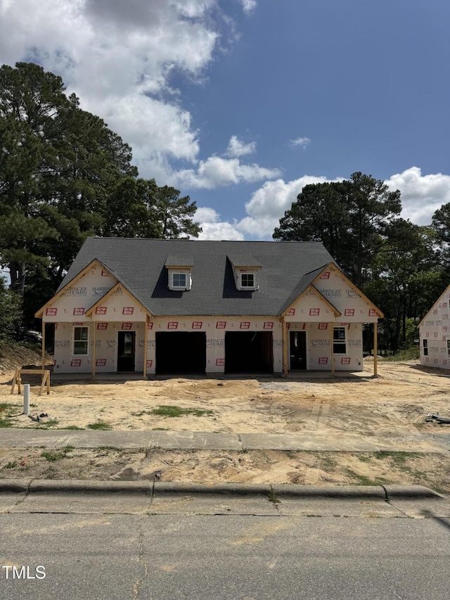 203 S Main St Unit B, Four Oaks, NC 27524 - property under construction featuring driveway, a garage, and a shingled roof