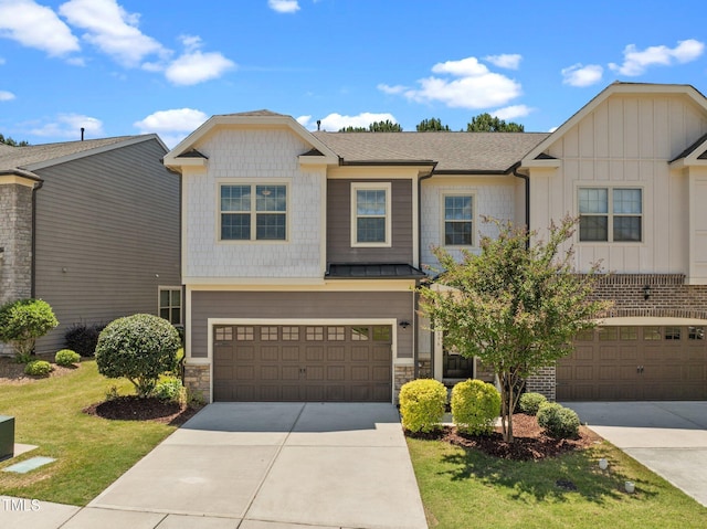 1896 Blue Jay Pt, Apex, NC 27502 - craftsman-style house with concrete driveway, an attached garage, stone siding, a front yard, and board and batten siding