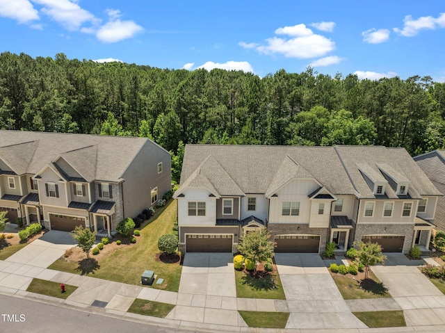 1896 Blue Jay Pt, Apex, NC 27502 - aerial view of property and surrounding area with a forest