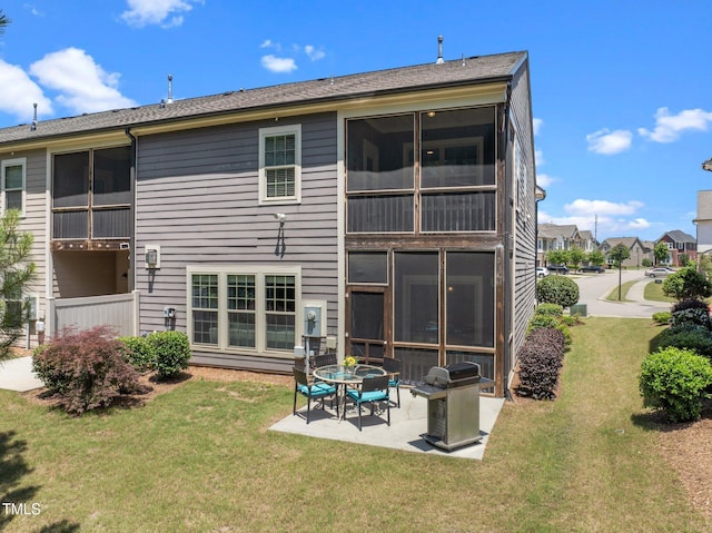 1896 Blue Jay Pt, Apex, NC 27502 - back of house with a patio and a lawn