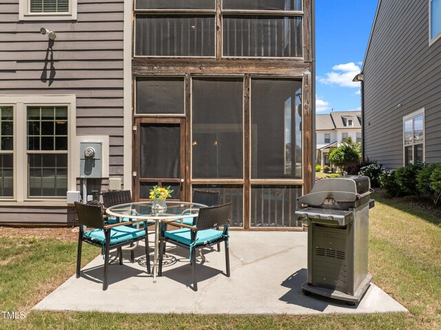 1896 Blue Jay Pt, Apex, NC 27502 - view of patio / terrace with area for grilling and outdoor dining space