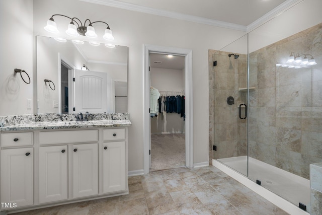 1896 Blue Jay Pt, Apex, NC 27502 - bathroom featuring a shower stall, vanity, a spacious closet, crown molding, and baseboards