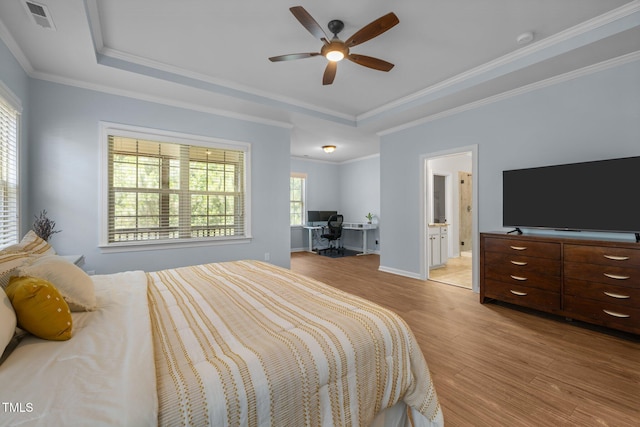 1896 Blue Jay Pt, Apex, NC 27502 - bedroom with light wood-style flooring, a raised ceiling, crown molding, baseboards, and a ceiling fan