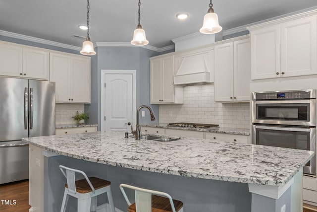 1896 Blue Jay Pt, Apex, NC 27502 - kitchen featuring appliances with stainless steel finishes, premium range hood, a sink, a breakfast bar area, and backsplash