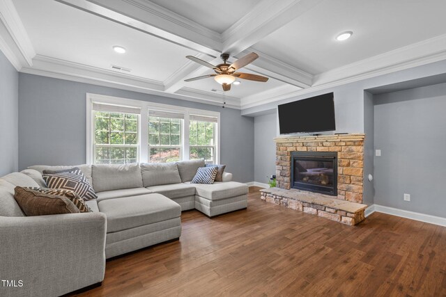 1896 Blue Jay Pt, Apex, NC 27502 - living room featuring a ceiling fan, wood finished floors, a fireplace, beamed ceiling, and coffered ceiling