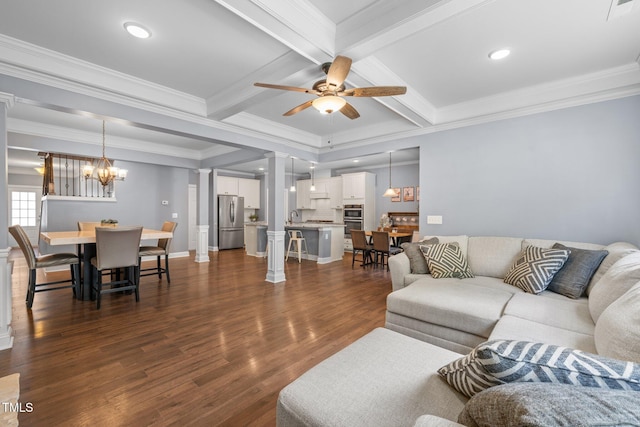1896 Blue Jay Pt, Apex, NC 27502 - living room with beamed ceiling, a ceiling fan, dark wood-style flooring, crown molding, and a chandelier