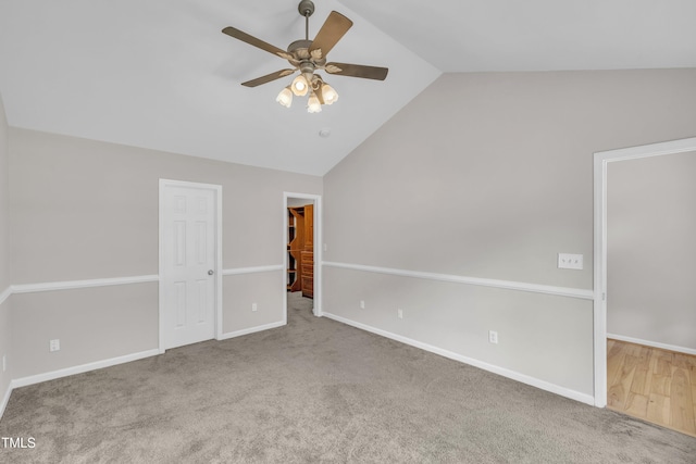 113 Feezor Ct, Clayton, NC 27527 - unfurnished bedroom with a walk in closet, carpet floors, high vaulted ceiling, a ceiling fan, and a closet