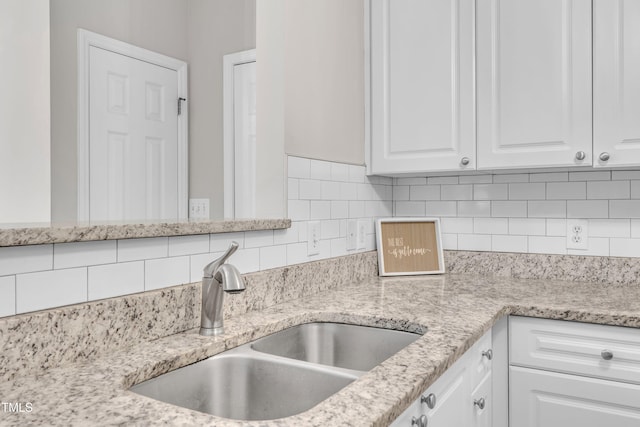 113 Feezor Ct, Clayton, NC 27527 - kitchen featuring white cabinets, backsplash, and light stone countertops