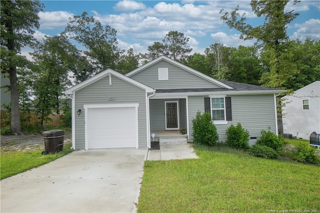 29 York Ct, Spring Lake, NC 28390 - single story home with concrete driveway, a garage, and a front yard